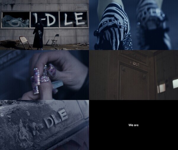 여섯 개의 이미지가 콜라주로 배열되어 있다. 첫 번째 이미지는 깨진 창문에 'G I-DLE'이 쓰여 있고, 검은 옷을 입은 인물이 서 있다. 두 번째 이미지는 얼룩말 무늬 신발 위에 장식이 달려 있다. 세 번째 이미지는 손톱에 보석 장식을 붙이고 있는 모습이다. 네 번째 이미지는 문 위에 'I-DLE'이라는 글자가 써져 있다. 다섯 번째 이미지는 먼지 낀 자동차 표면에 'I-DLE' 엠블럼이 보인다. 여섯 번째는 검은 배경에 하얀 글씨로 'We are'라고 적혀 있다.